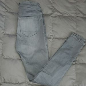 White washed grey skinny jeans